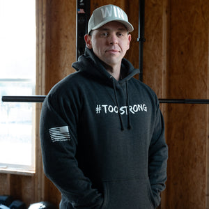 Sam in a Large #TOOSTRONG Hoodie